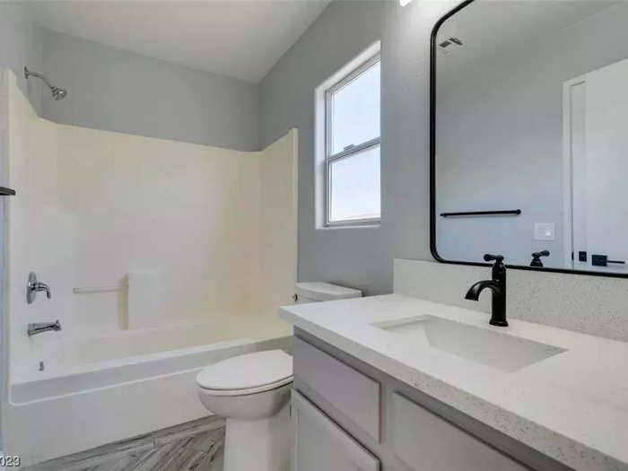 Both bathrooms have clean layouts with lots of storage.