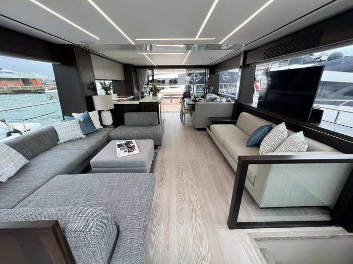 The main deck only feels bigger as you move through to the living area with two comfortable sofas.