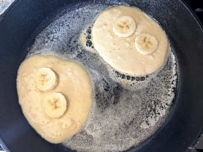 I ladled the pancake batter into the pan, making two pancakes on my first attempt.