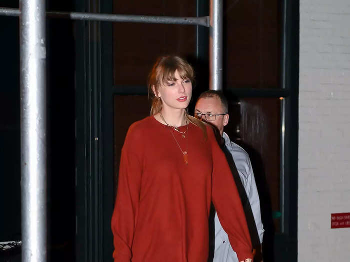 To kick off the fall season, Swift stepped out in September wearing a burnt-orange sweater dress and luxury accessories.