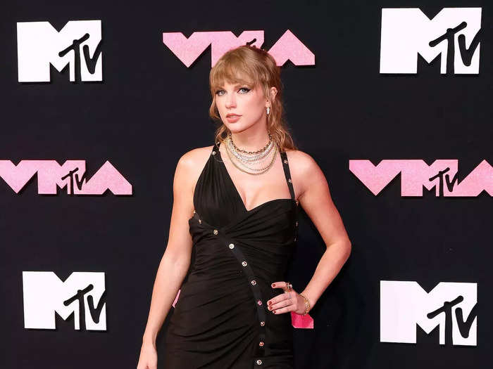 She then attended the MTV Video Music Awards in a daring Versace dress with an asymmetrical neckline.