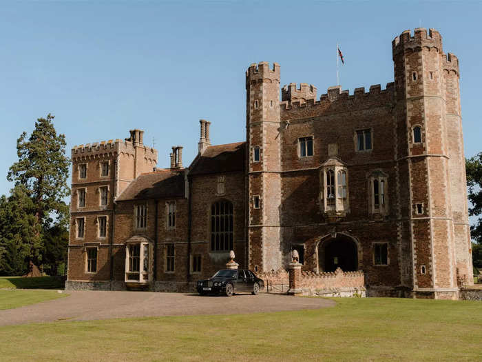 It is surrounded by a moat and acres of woodland and farmland.