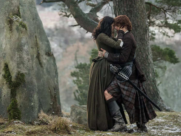 Jamie and Claire carving their initials on each other might