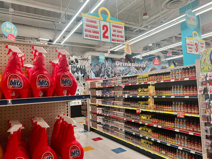 The interactive experience starts in a supermarket with aisles full of fake products like sauces, cereal, medicine, and canned soup.