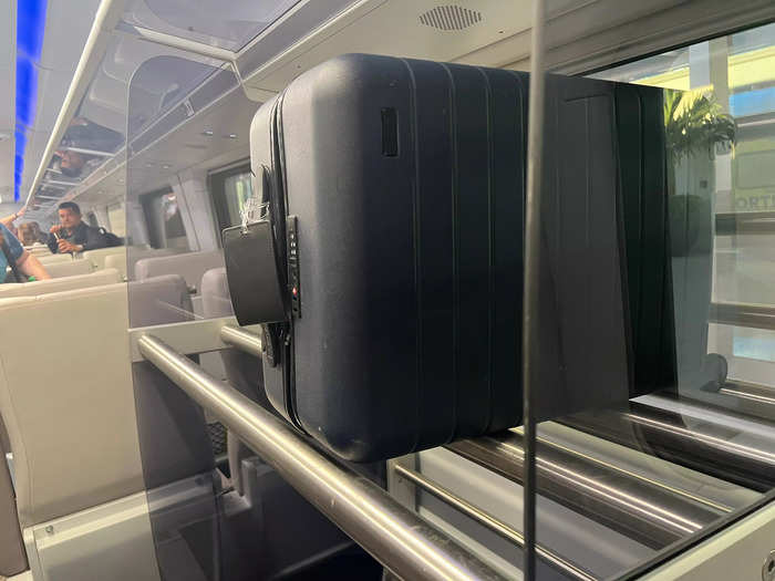 Luggage racks are available above the seats and at the end of each car.