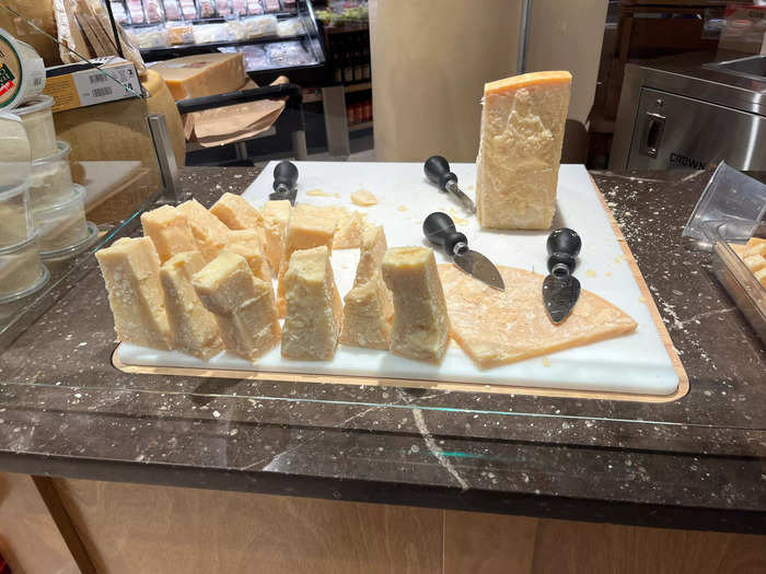 In the dairy section, an employee handed out samples of Parmesan cheese.