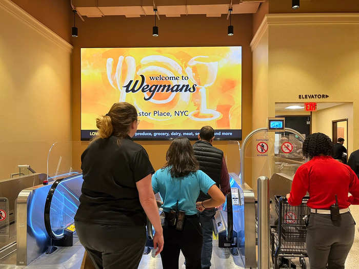 Wegmans featured screens advertising the store