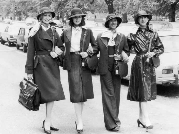 In the 1970s, British Airways flight attendants wore pinstriped sets with white shirts and double-breasted overcoats.