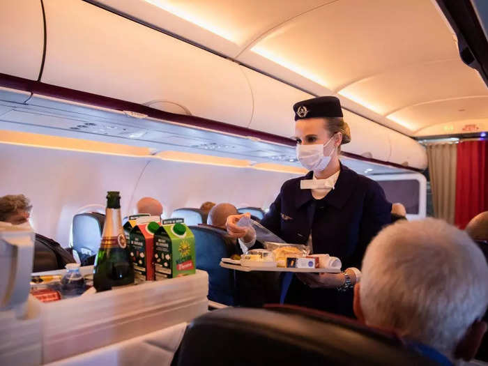 Today, cabin crews on Air France wear navy suits with white ties.