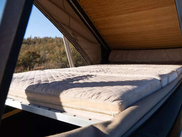 The camper comes with a bed that can comfortably sleep two people.