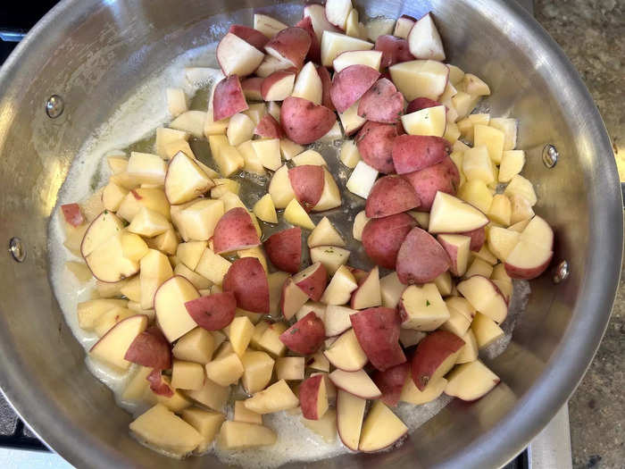 Then I added the potatoes and onions, cooking them over medium-low heat for about 15 minutes.