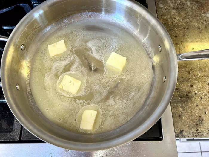 Before adding the potatoes, I melted some butter in a sauté pan.