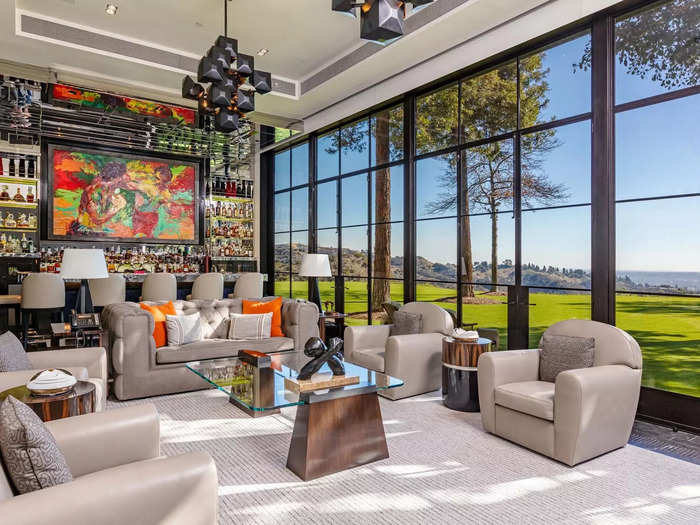 Rocky also appeared in the artwork seen in the cigar room, which also had floor-to-ceiling windows that let in plenty of natural light while offering panoramic views of the surrounding lawns and hills.