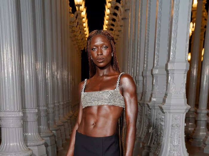 Jodie Turner-Smith paired a bedazzled crop top with a black skirt.