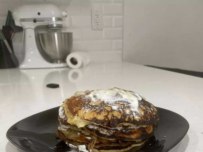 Stewart said to add dollops of sour cream and applesauce between each pancake in the stack.