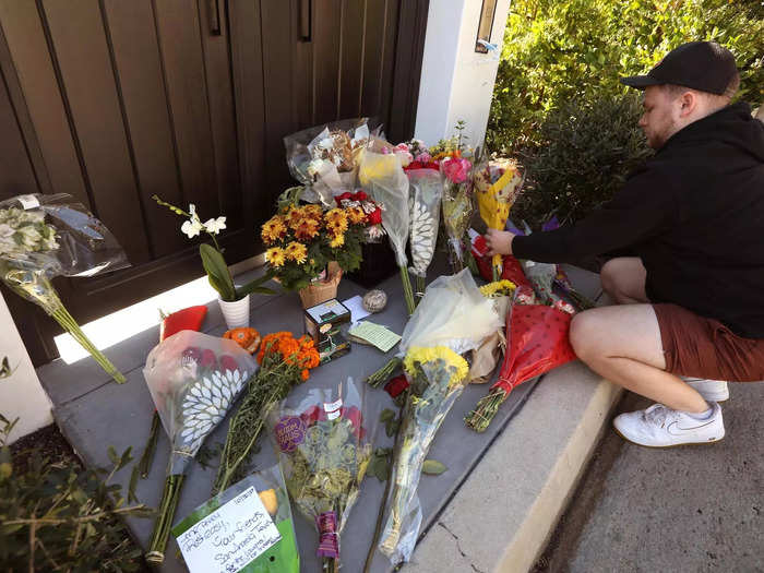 They laid flowers outside his front door.