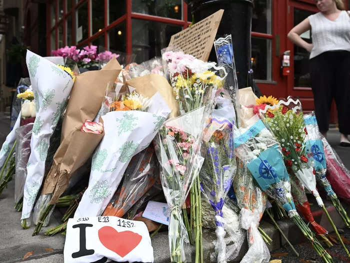 A closeup shows the array of floral tributes to the late actor.