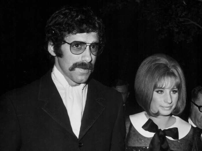 Streisand says she was escorted to the ceremony by her former husband, Elliott Gould, despite their separation.