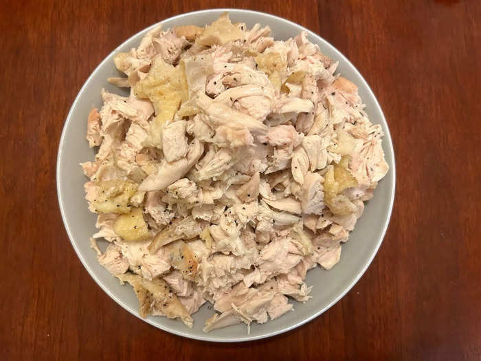 Once my chicken had cooled slightly,  I separated the meat from the bone and started chopping. 