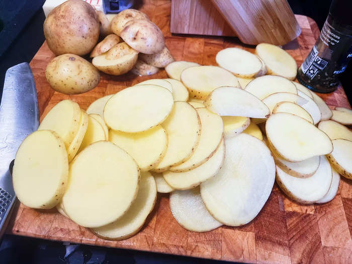 I started by preheating the oven to 350 degrees and thinly slicing about six yellow-gold potatoes.