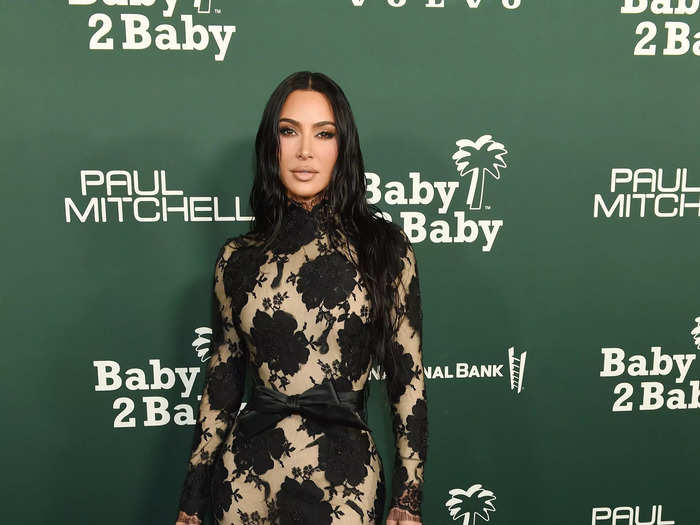 Kim Kardashian wore a sheer black gown with a beige lining. 