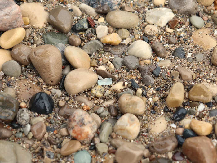 I spotted some sea glass amid the sand and rocks.