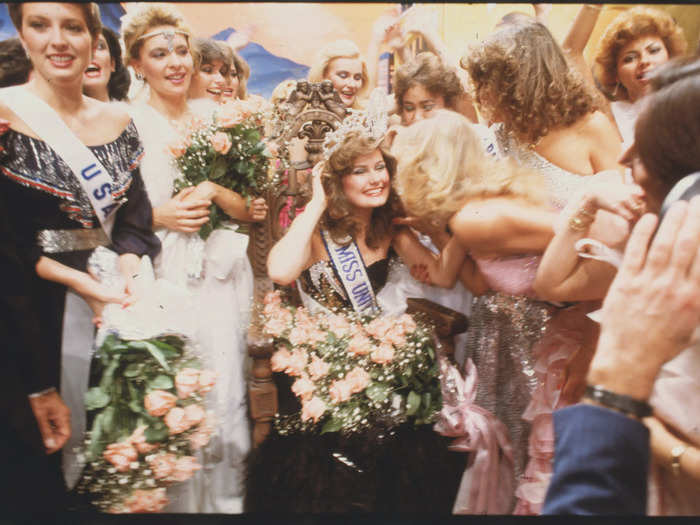 July 26, 1982: Karen Baldwin, the former Miss Canada, is congratulated by other beauty queens after being named Miss Universe.