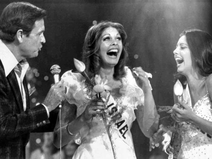 July 11, 1976: Bob Barker tells Miss Israel Rina Messinger that she is the new Miss Universe. He hosted every year from 1967 to 1987.