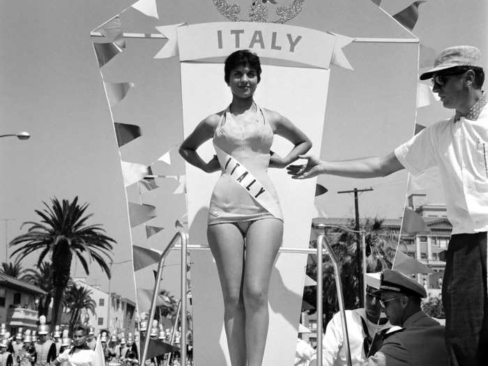 July 26, 1958: Miss Italy represents her country at the national parade.
