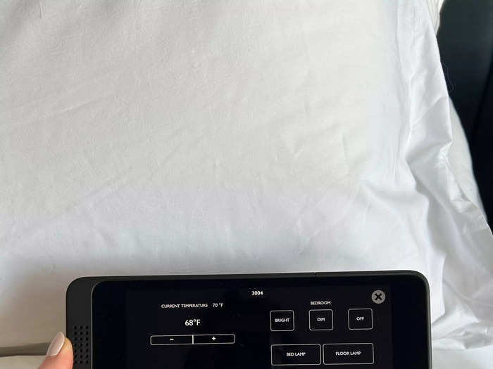 A bedside tablet controls the room