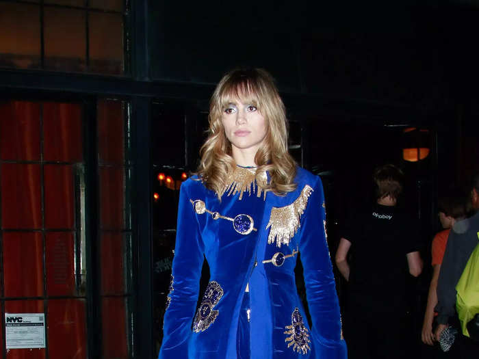 In 2018, Waterhouse was photographed in New York City wearing a royal-blue pantsuit with lavish gold embellishments. 
