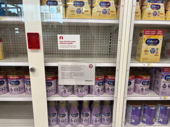 Baby formula was locked up with a sign reading that due to "high demand and limited inventory," customers could only purchase four per person.