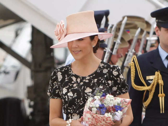 During a visit to Australia in 2011, the princess wore a floral, knee-length dress and a pink hat that was adorned with a faux rose.