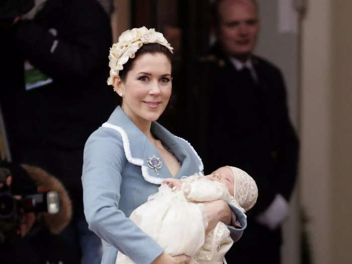 Mary wore a floral headpiece and a blue coat with a sapphire brooch that was gifted to her by Queen Margrethe for her son Prince Christian