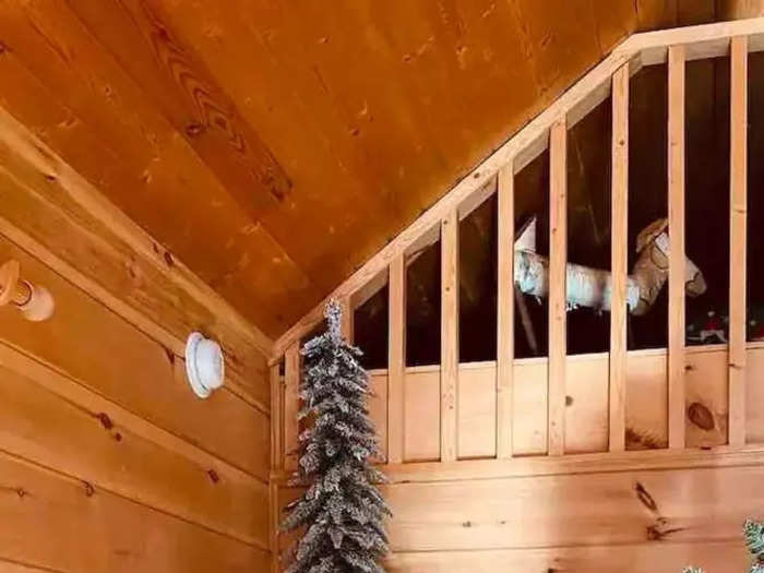 Her favorite decoration in the cabin is a Santa on the staircase that her mom hand-painted for her over 30 years ago. 