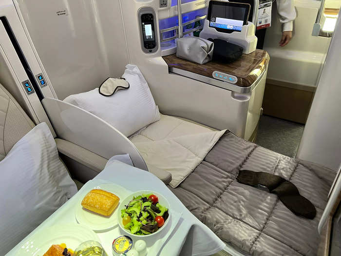 The business class seats transform into a flat bed.