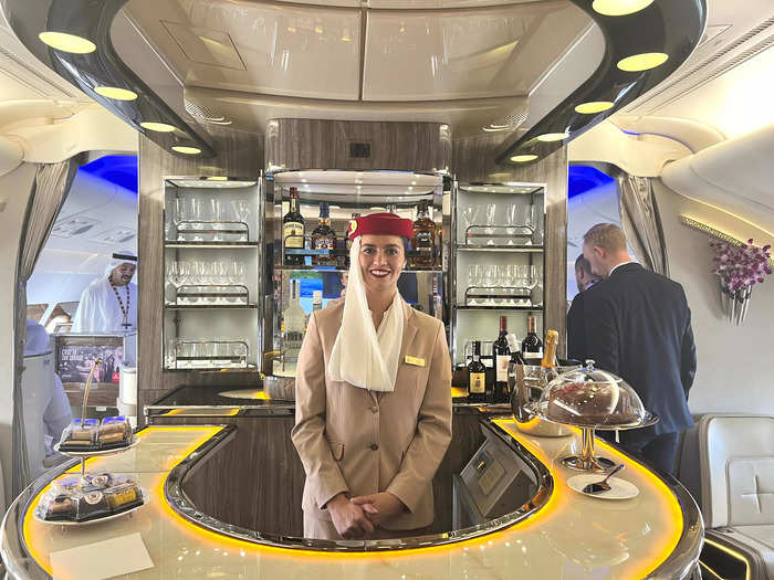 You first encounter the horseshoe-shaped bar for business and first-class passengers.
