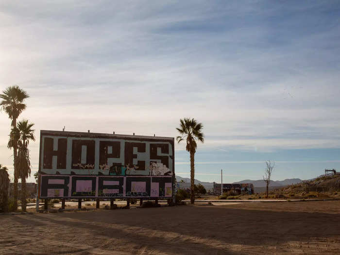 I pulled into a sandy lot, drove past billboards that I imagined once welcomed visitors, and made my way to a parking area. 