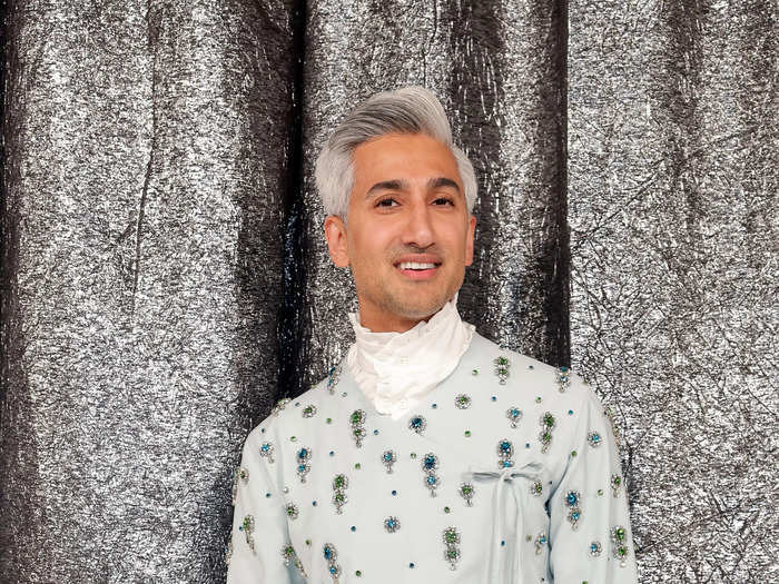 "Queer Eye" star Tan France wore a casual white, black, and blue look for the evening.