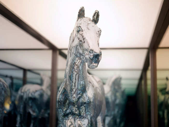 The silver horse prop from the tour — dubbed "Reneigh" by fans — was also on display at the premiere.