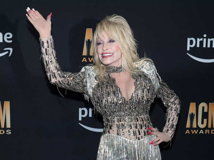 At the 2023 Academy of County Music Awards in May, Parton wore a partially sheer silver bodysuit. 