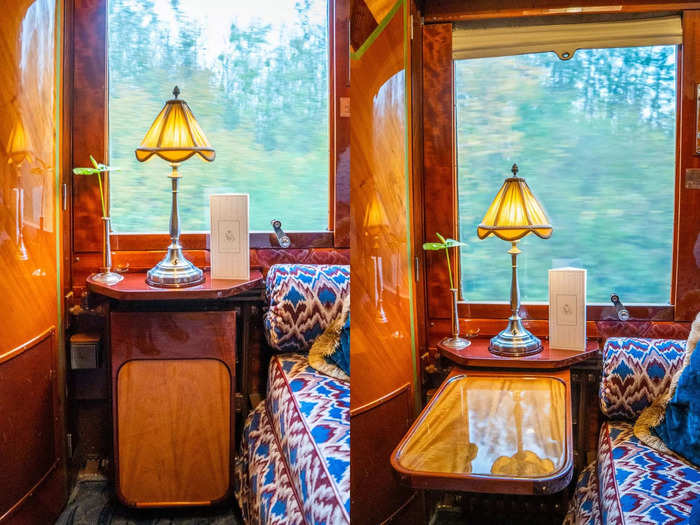 A pull-out table in front of the couch cleverly saved space in the small room. 