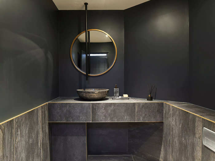 Minimalist bathrooms can lack vibrancy and warmth.