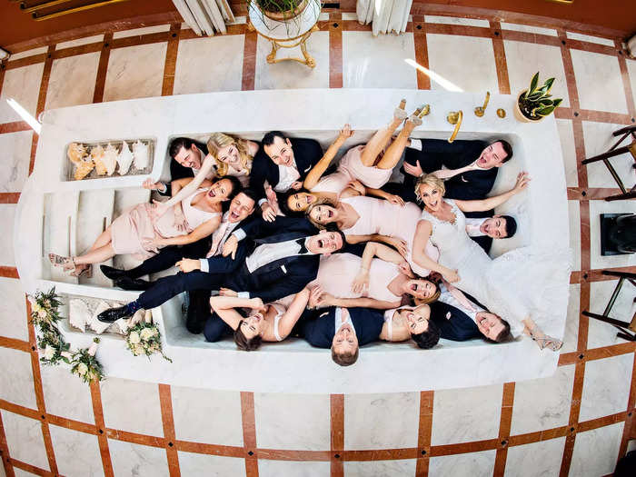 A bridal-party dog pile earned Jeff Tisman the top prize in the "I-Do" Crew category.