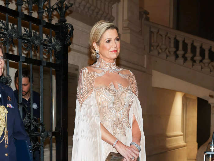 More recently, Máxima wore another daring look at a royal engagement in November 2023, opting for an Iris van Herpen gown with a semi-sheer neckline and a built-in cape.