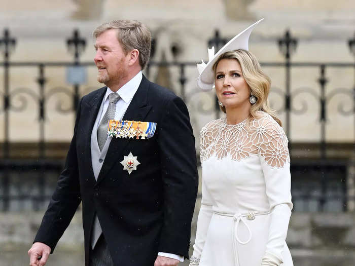 Wearing a bolder look, Máxima wore a Jan Taminiau dress with floral cutouts and paired it with an asymmetrical fascinator at King Charles