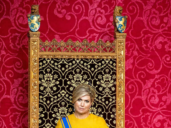 At the 2020 state opening of Parliament, the queen wore a Claes Iversen dress with ruffled detailing. She rounded off the look with a gold headband by Maison Fabienne Delvigne, gold gloves, and a royal sash.