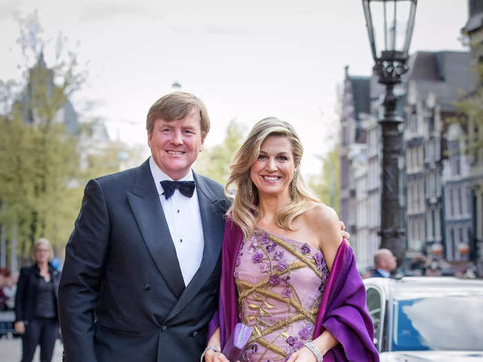 Máxima stood out in a one-shoulder lilac dress embroidered with purple flowers and gold detailing in 2017. She completed the look with a purple shawl and wore her hair down in relaxed waves.