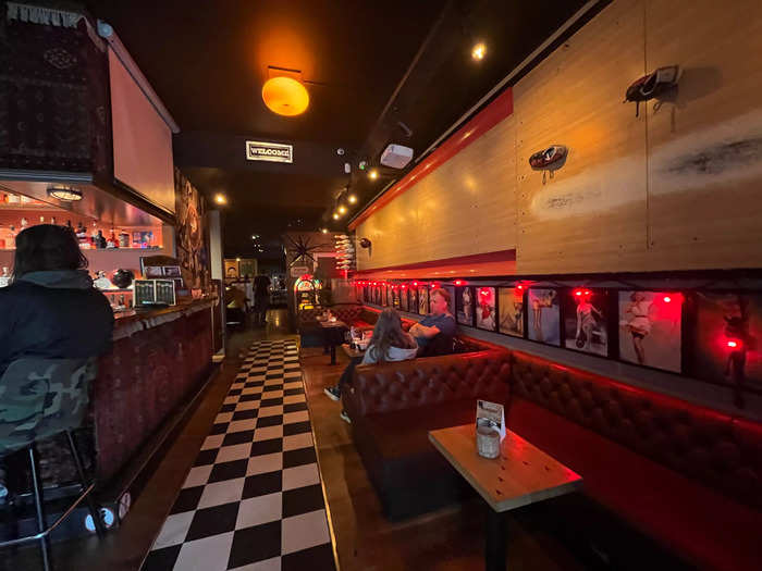 The front section of the bar looked like an American-style diner with booths and bowling accessories.