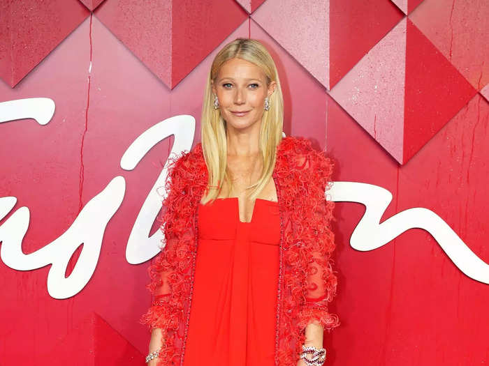 Gwyneth Paltrow matched the red carpet with her long, red dress.